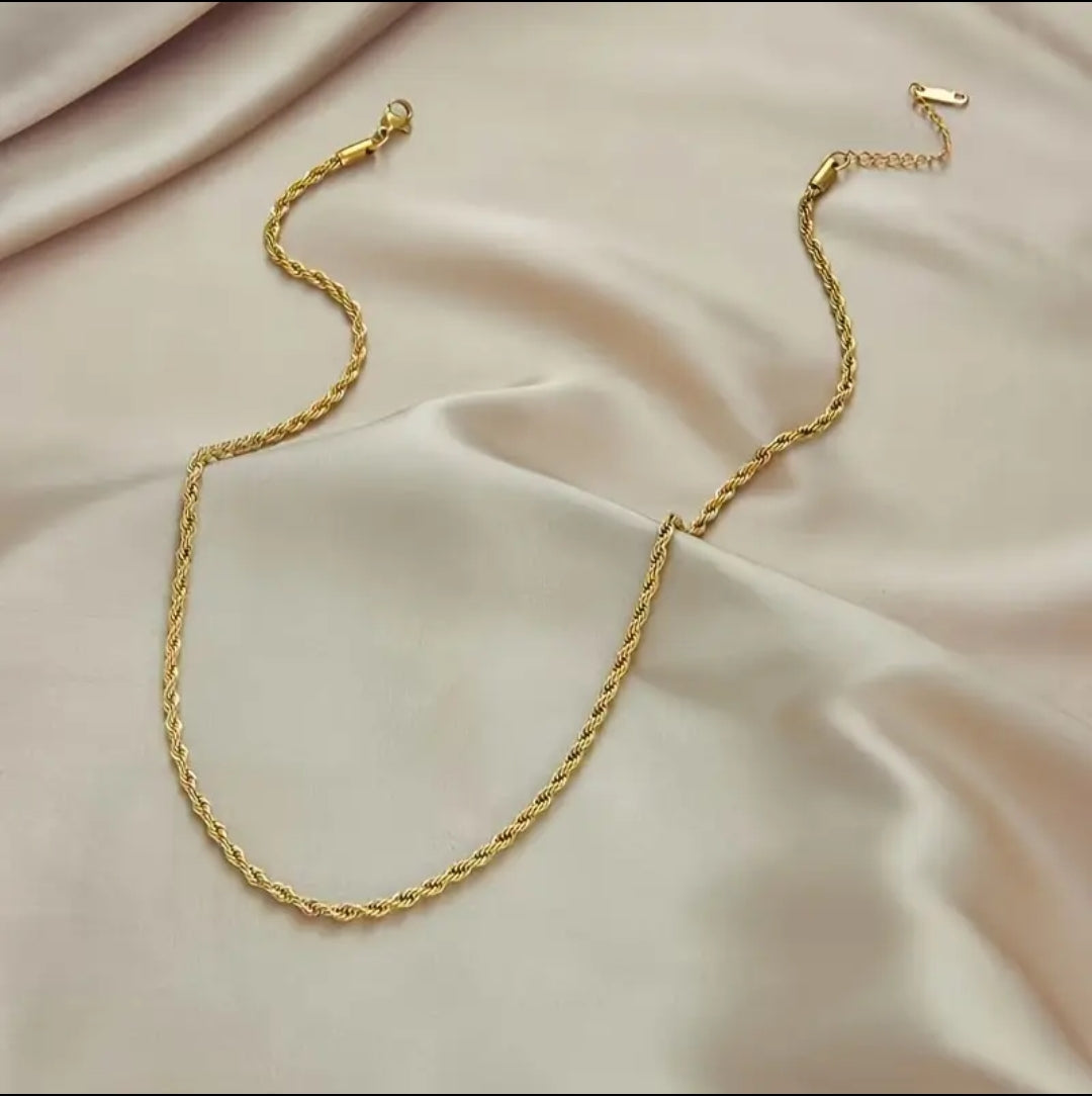 Combo cadena + pulsera tejido laso 18k